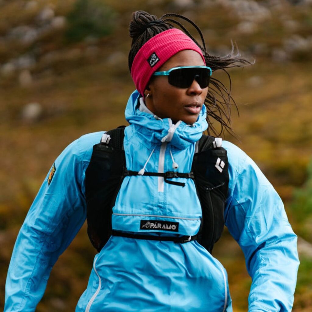 Female walker in sunglasses and lightweight jacket