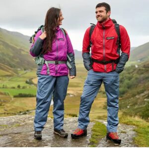 Man and woman on mountainside wearing their Valez windproof jackets