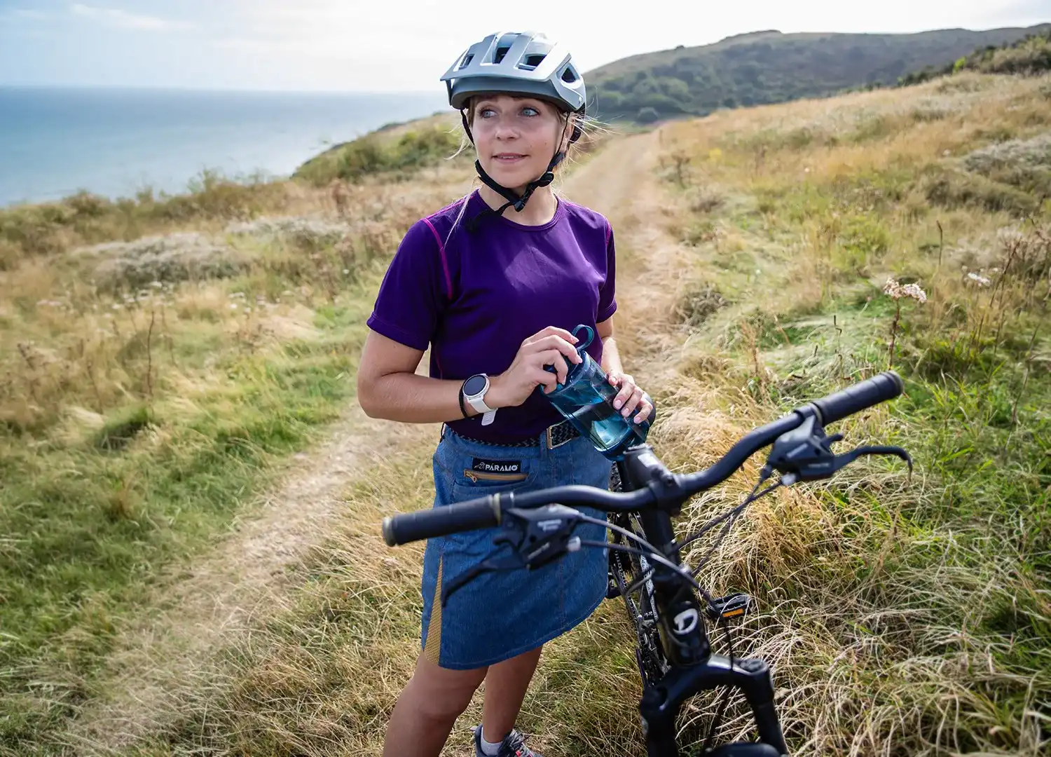 Women Standing Next To Mountainbike Wearing Womens Velez Skort